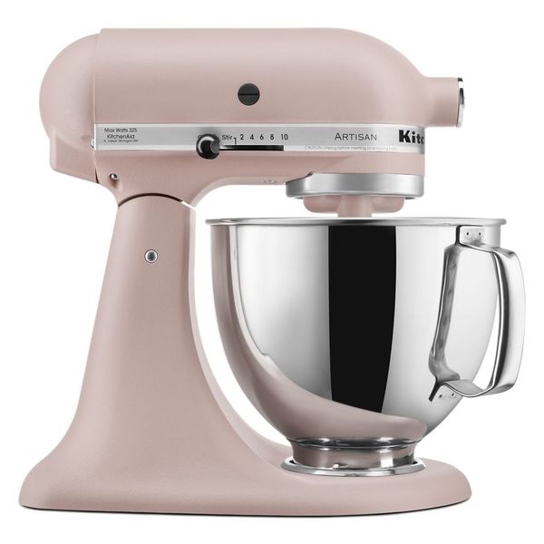 KitchenAid KSM150PSFT Artisan tilt-head mixer in Feather Pink with a handled stainless-steel bowl